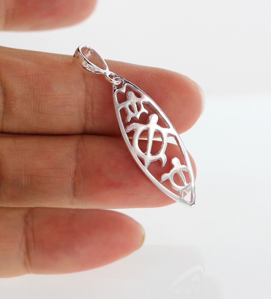 Silver pendant<br>Three turtle surfboard